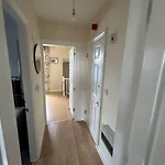 The Snuggly Den Apartment